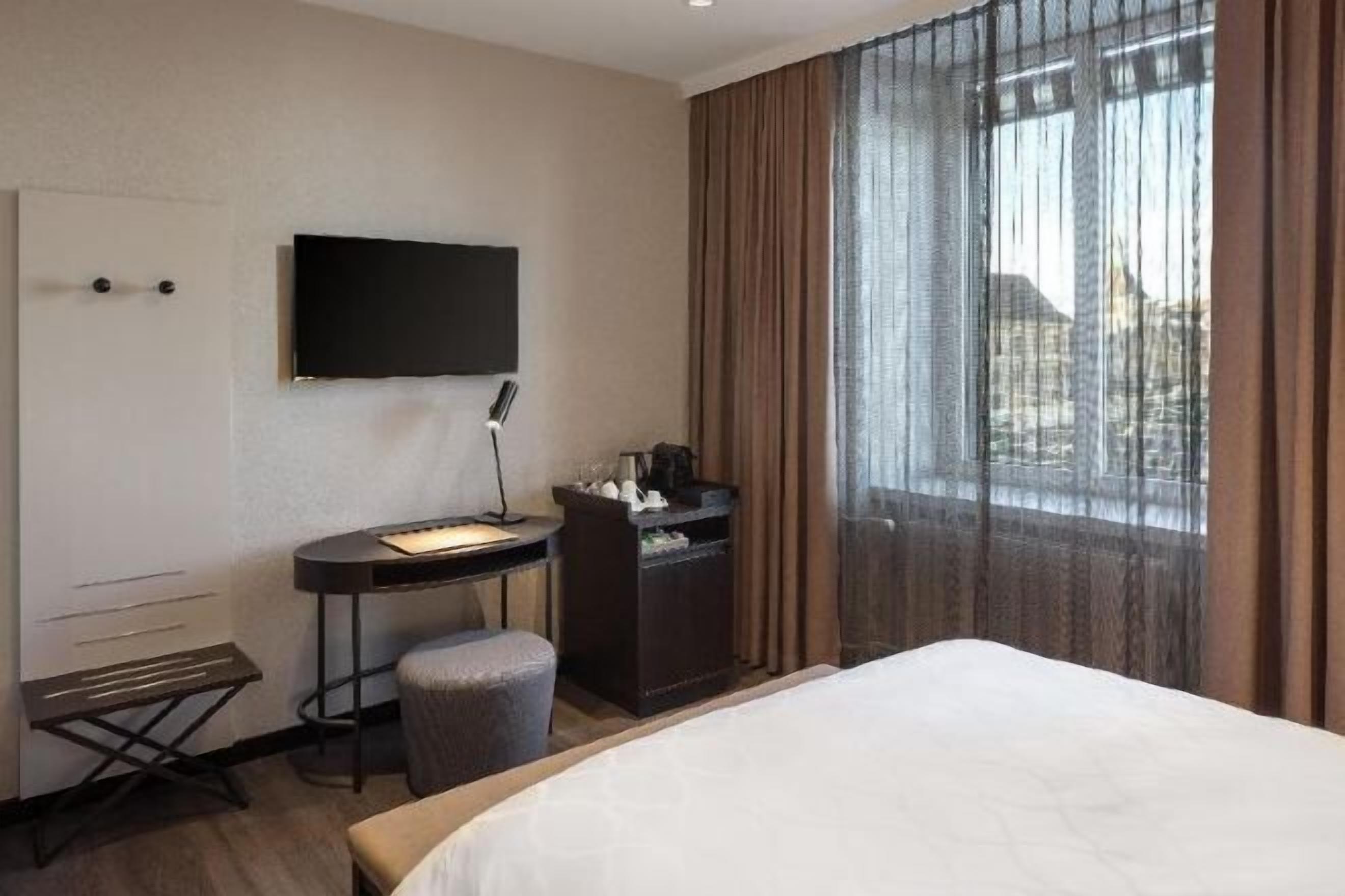 Ropa de cama hipoalergénica y minibar 
