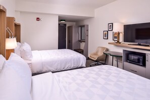 Premium bedding, down duvets, desk, laptop workspace