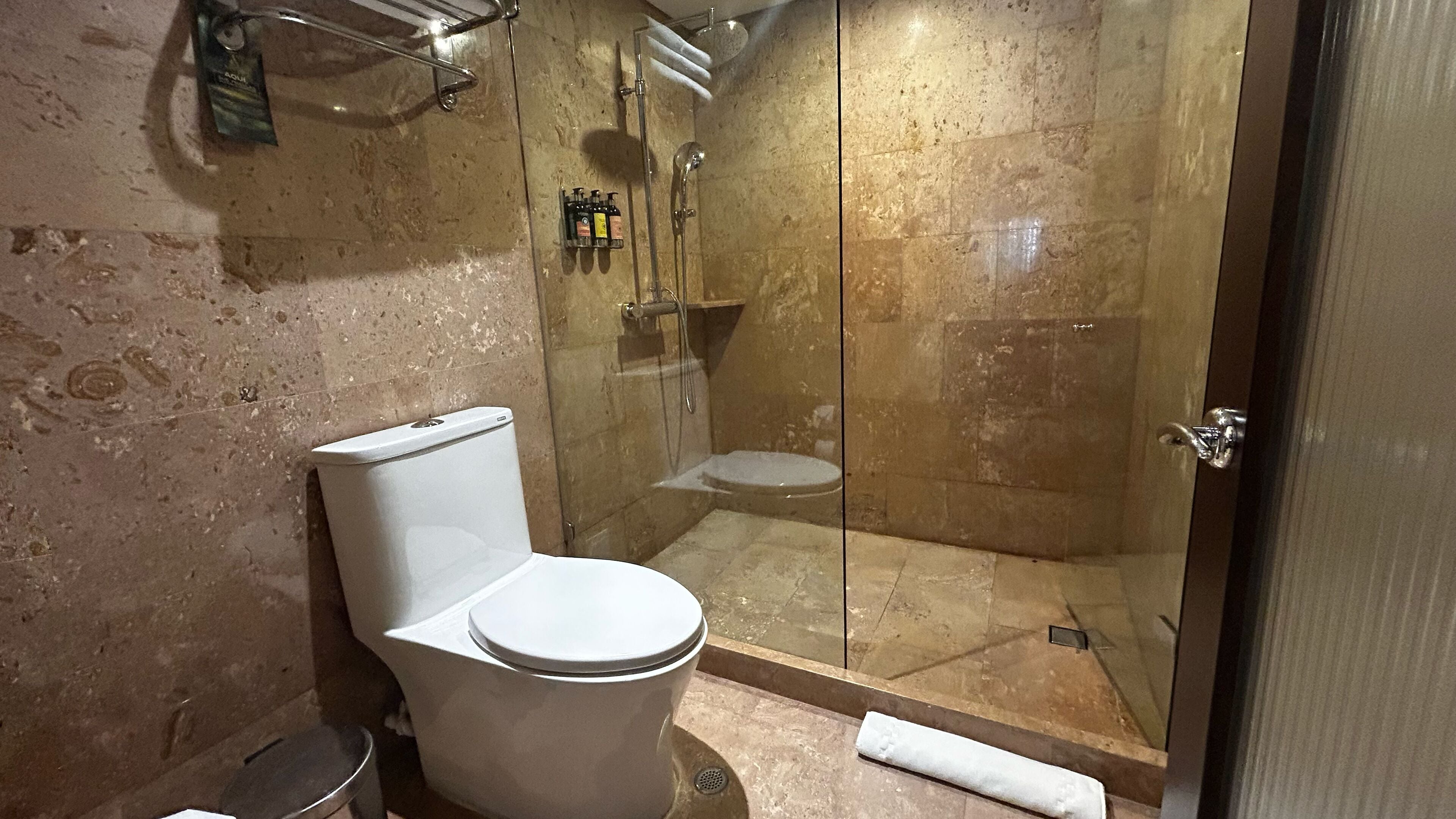 luxury room, 1 king bed | bathroom | shower, designer toiletries, hair dryer, bathrobes