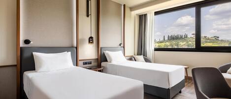 Premium bedding, in-room safe, desk, soundproofing