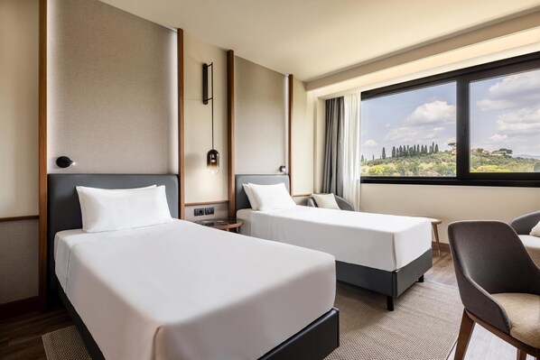 Premium bedding, in-room safe, desk, soundproofing