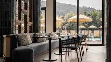 Breakfast, lunch, dinner served; local cuisine