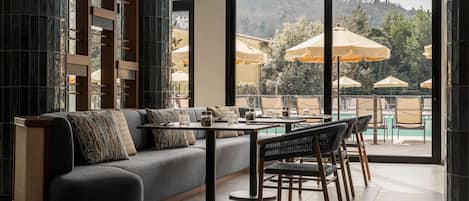 Breakfast, lunch, dinner served; local cuisine