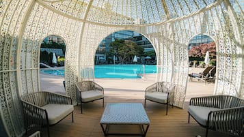 Indoor pool, outdoor pool, free pool cabanas, pool umbrellas