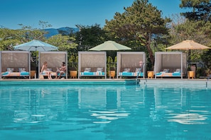 Indoor pool, outdoor pool, cabanas (surcharge), pool umbrellas