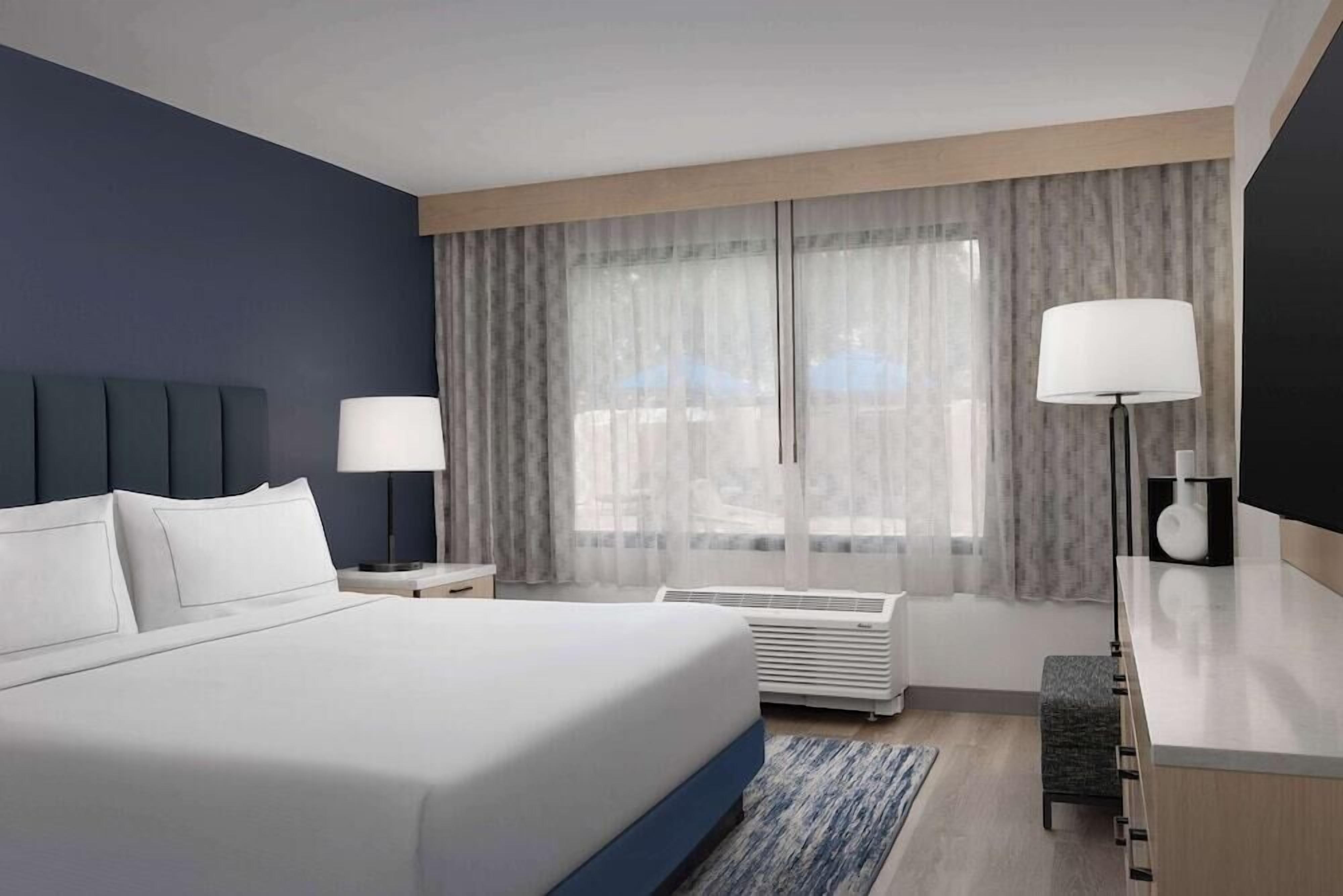 Premium bedding, pillow-top beds, in-room safe, desk