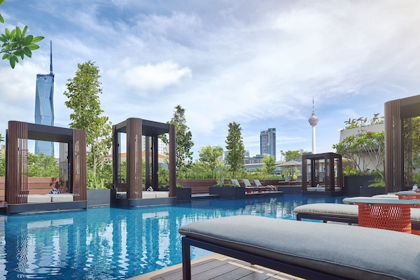 Outdoor pool, open 7:00 AM to 8:00 PM, free pool cabanas, pool loungers