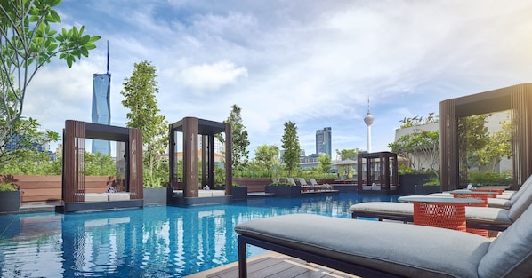 Outdoor pool, open 7:00 AM to 8:00 PM, free cabanas, sun loungers
