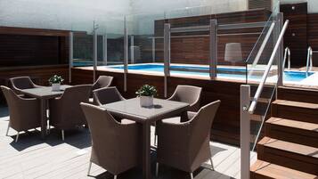 Outdoor pool, pool umbrellas, pool loungers