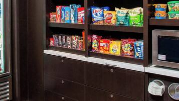 A snack vending machine with various chips and snacks.