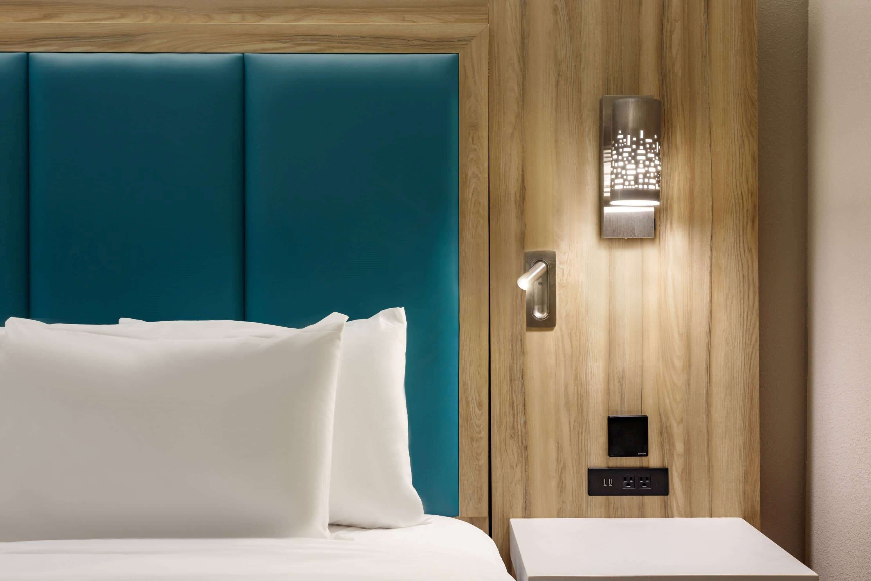 Premium bedding, pillowtop beds, desk, blackout drapes