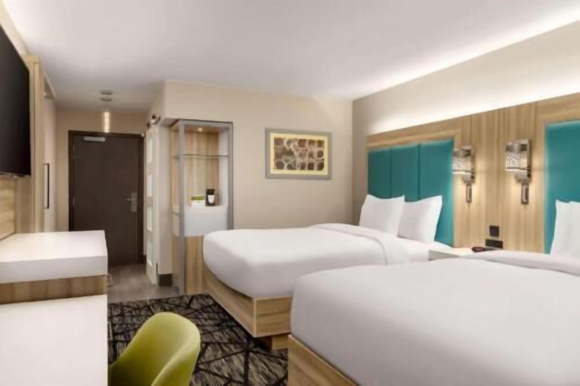 Premium bedding, pillowtop beds, desk, blackout drapes