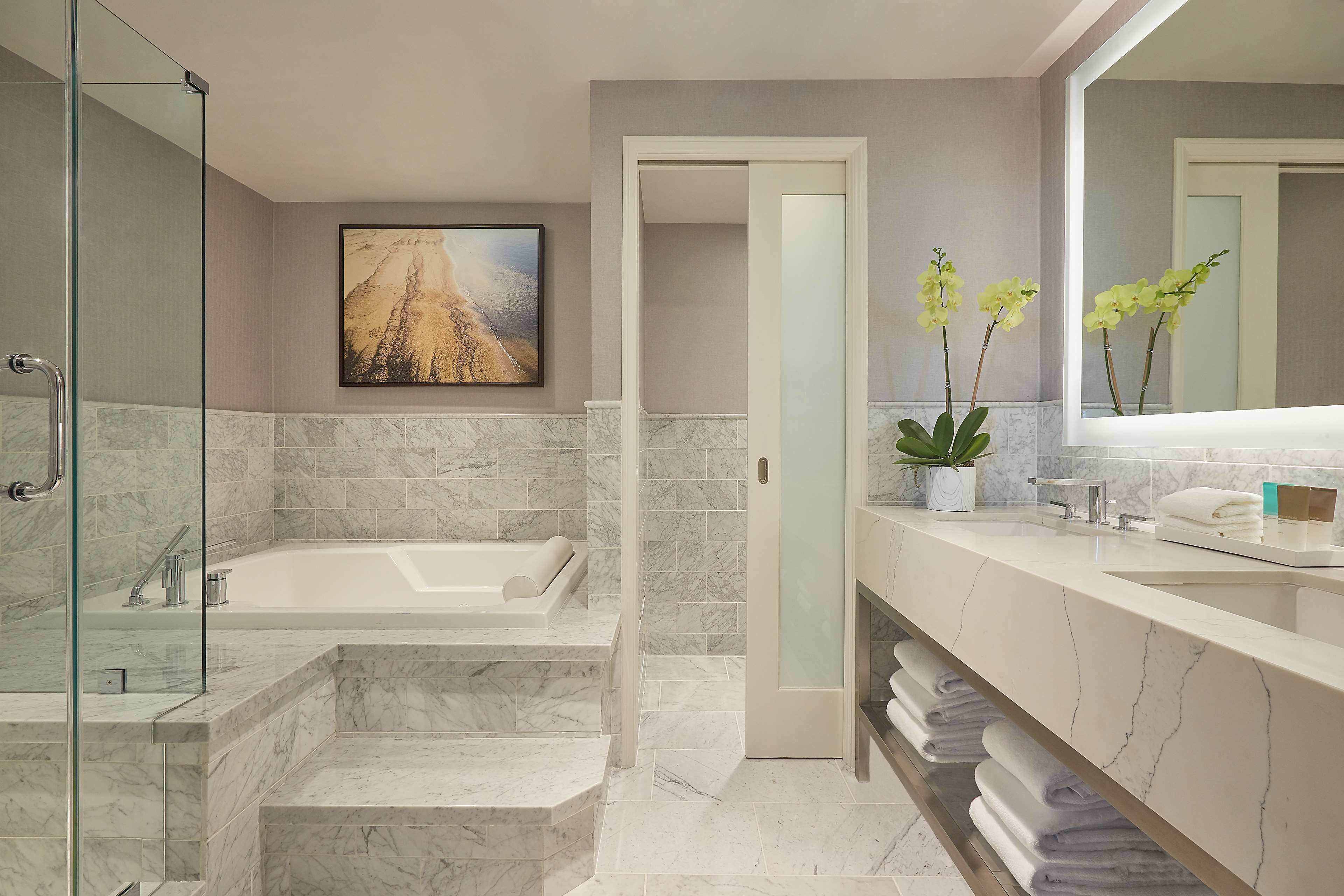 shower, designer toiletries, hair dryer, slippers