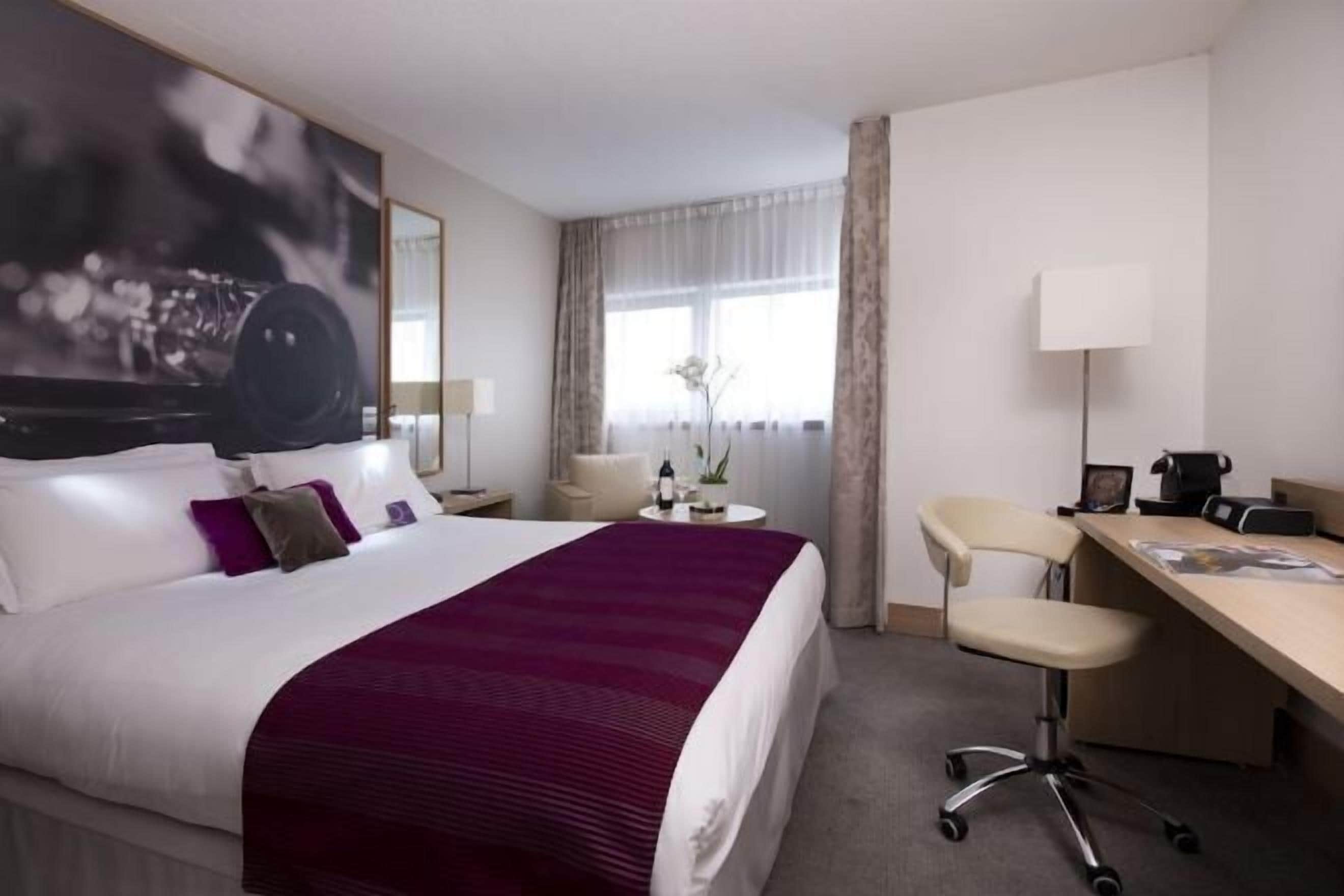 Premium bedding, in-room safe, desk, soundproofing