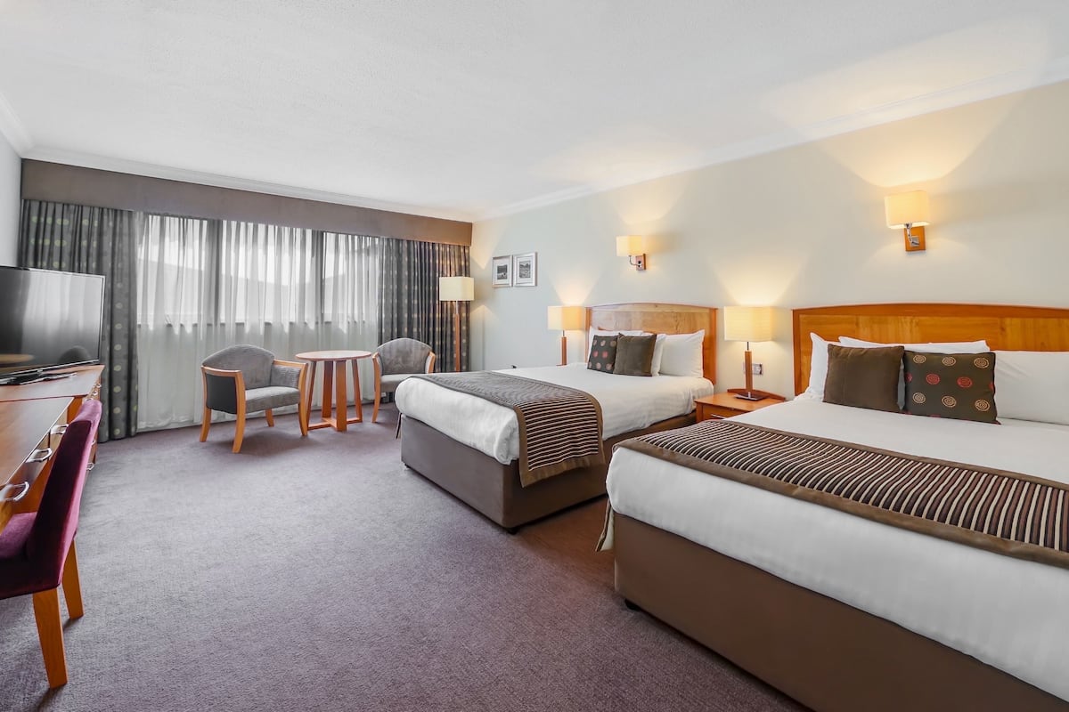 standard quadruple room, 2 double beds | in-room safe, desk, iron/ironing board, free wifi