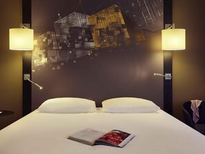 Pillow-top beds, minibar, in-room safe, blackout curtains