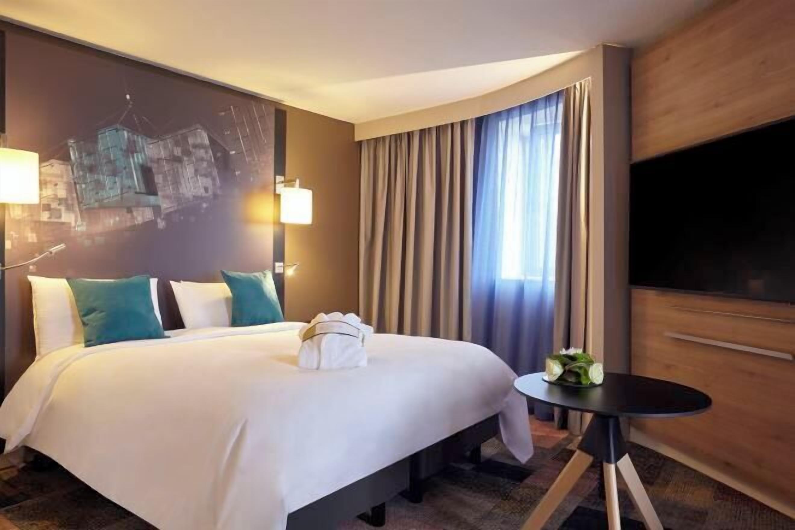 加厚床垫、迷你吧、客房内保险箱、遮光窗帘