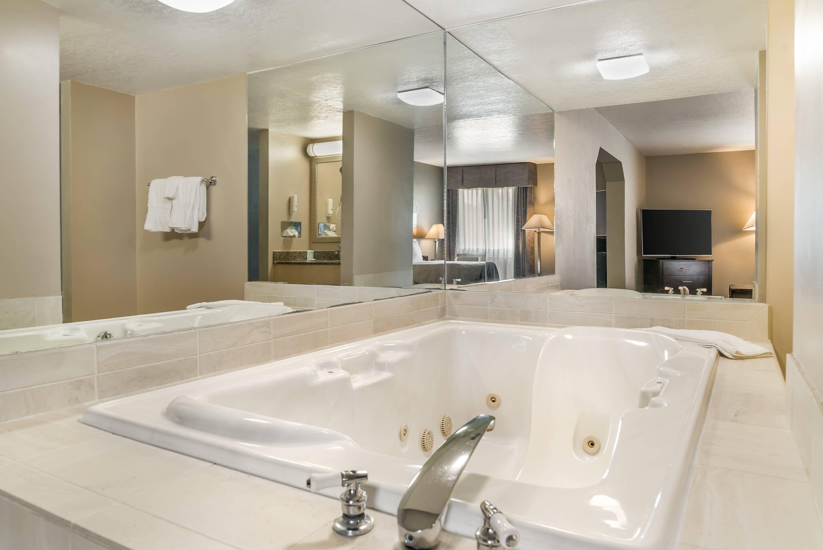 in-room safe, desk, blackout curtains, iron/ironing board