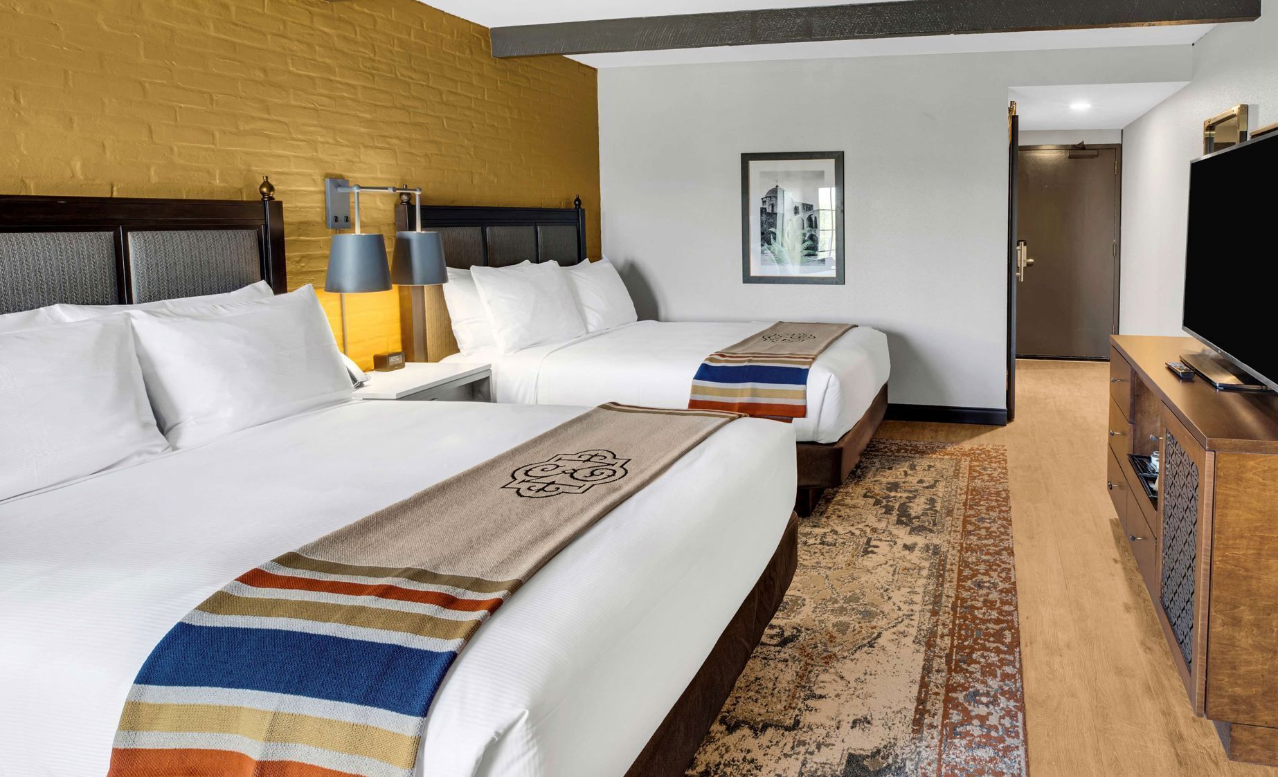 Premium bedding, down comforters, in-room safe, desk