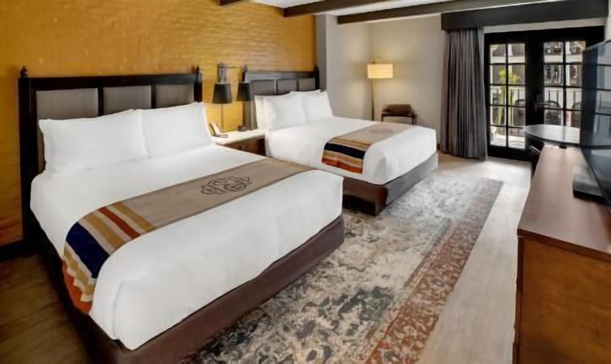 Premium bedding, down comforters, in-room safe, desk