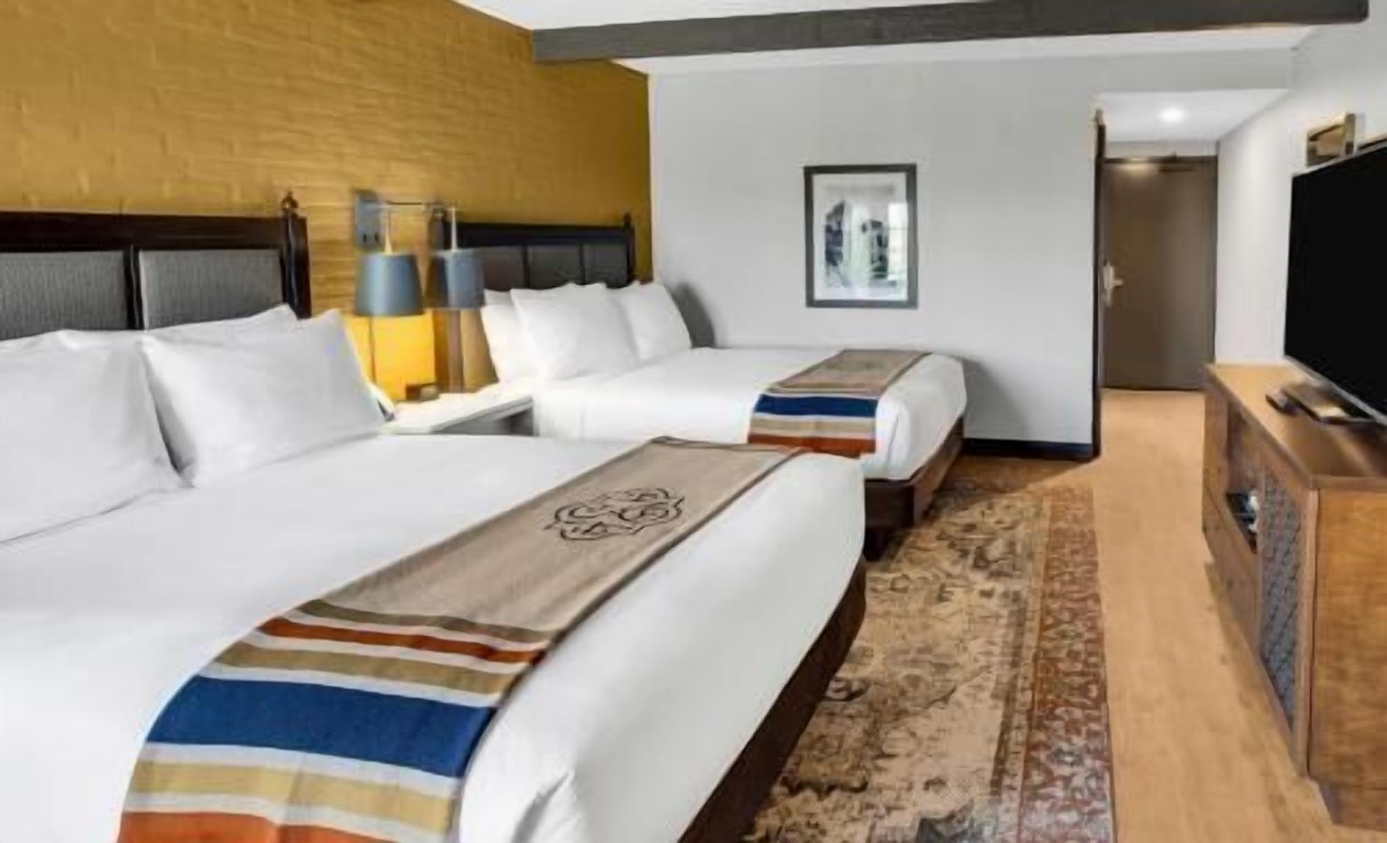 Premium bedding, down comforters, in-room safe, desk