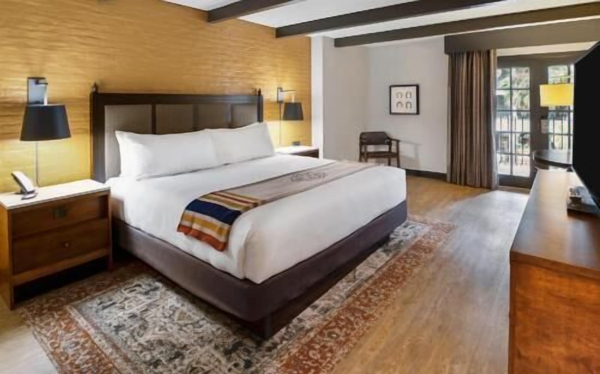 Premium bedding, down comforters, in-room safe, desk