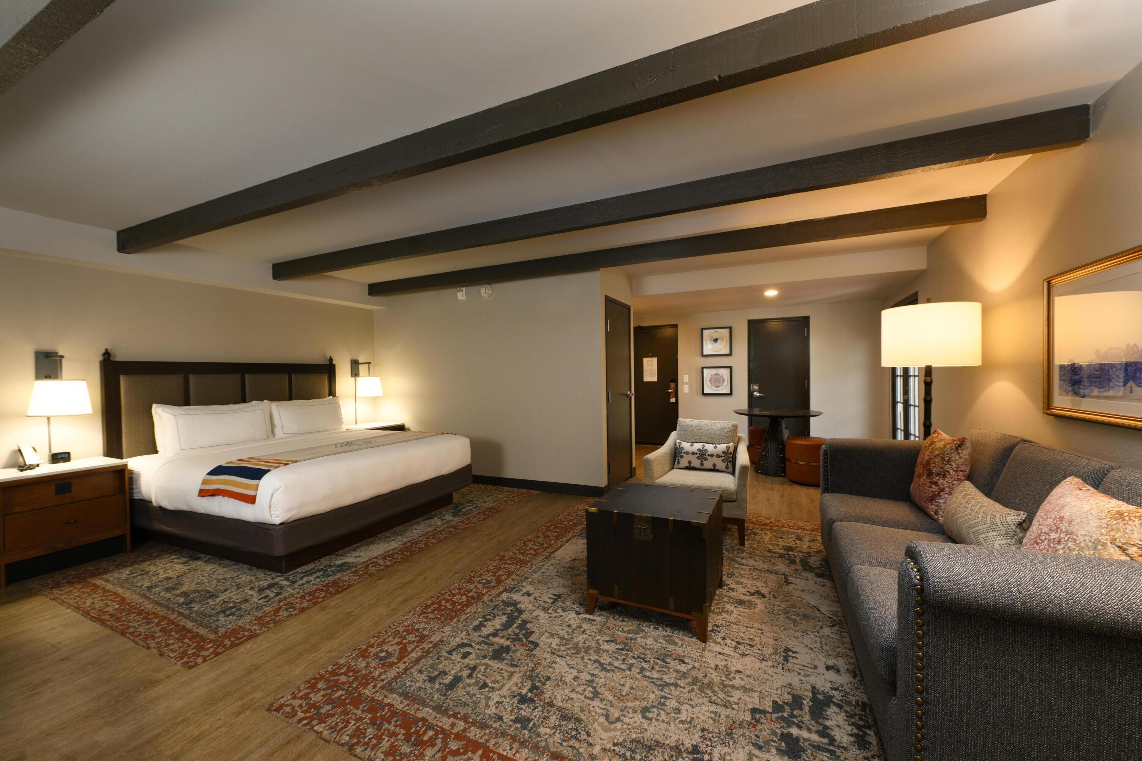 Room, 1 King Bed, Corner (Hearing) | Living area | 55-inch LCD TV with cable channels, TV