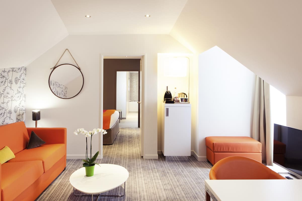 Executive-Suite, 1 King-Bett und Schlafsofa | Hochwertige Bettwaren, Zimmersafe, Verdunkelungsvorhänge