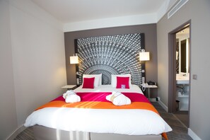 Premium bedding, in-room safe, blackout curtains, soundproofing