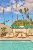 Outdoor pool, open 11:00 AM to 6:00 PM, sun loungers