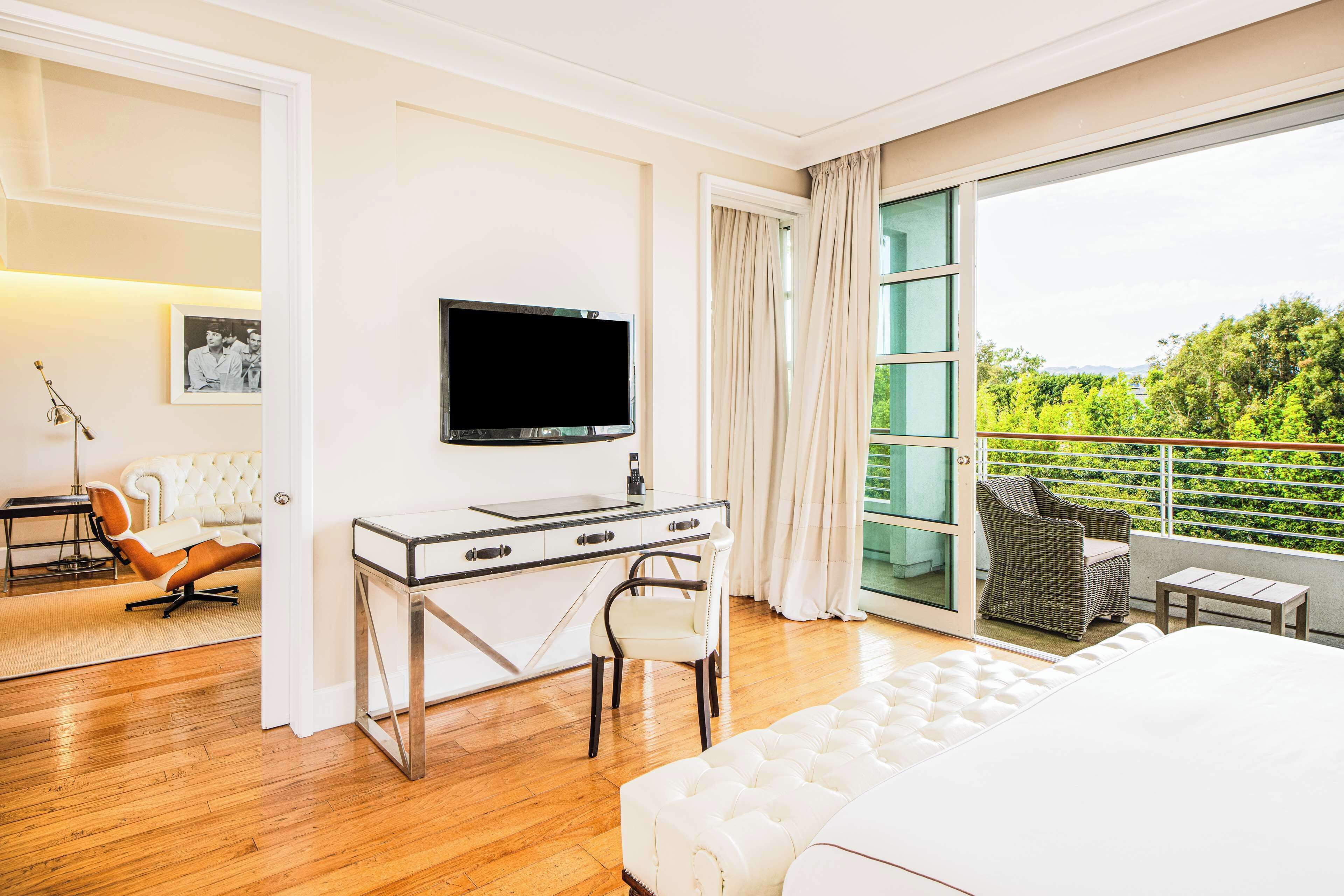 suite, 1 king bed, balcony (beverly hills) | premium bedding, down duvets, pillow-top beds, in-room safe