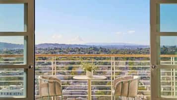 Premium bedding, down comforters, pillowtop beds, minibar