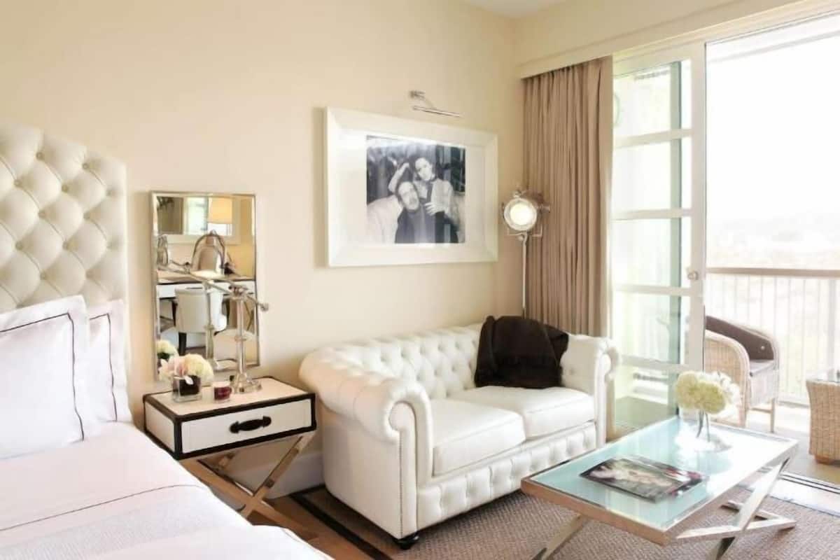 Premium bedding, down comforters, pillowtop beds, in-room safe