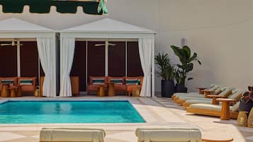 Outdoor pool, open 11:00 AM to 6:00 PM, sun loungers