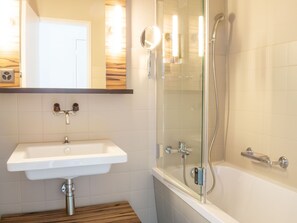 Eco-friendly toiletries, hair dryer, towels