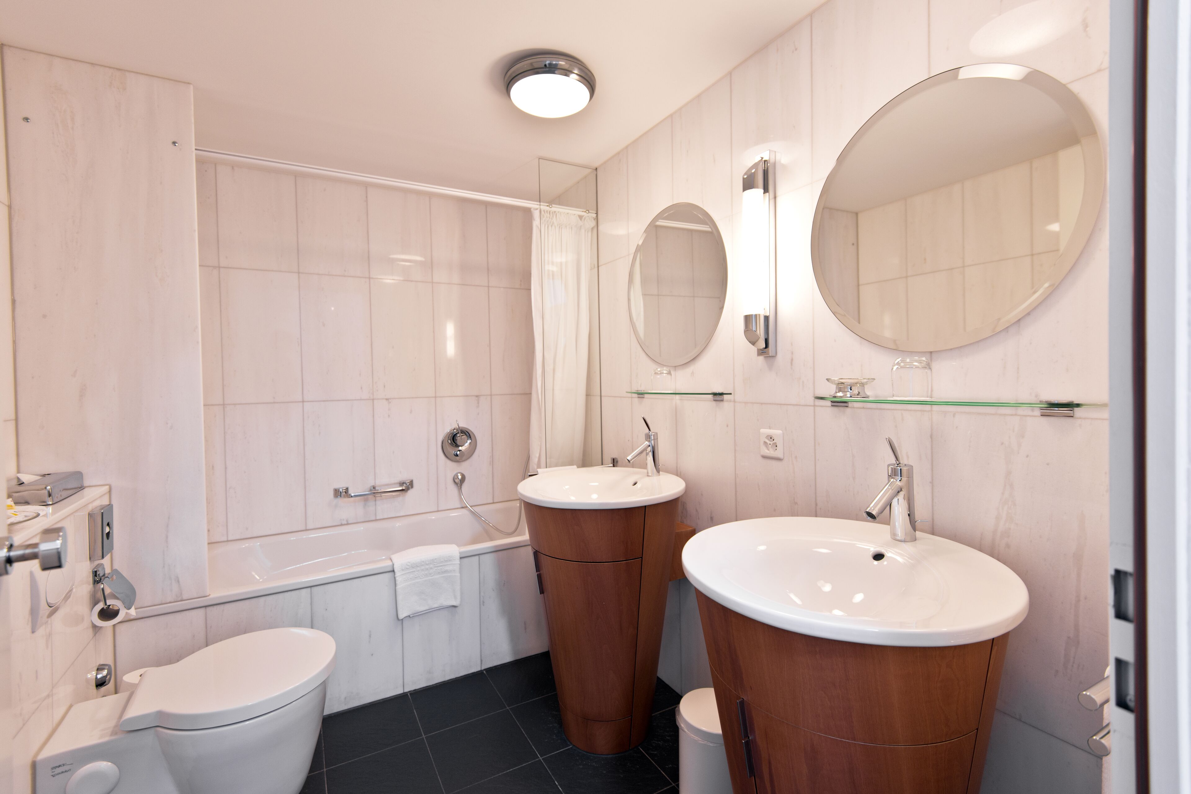 deluxe double or twin room | bathroom | eco-friendly toiletries, hair dryer, towels