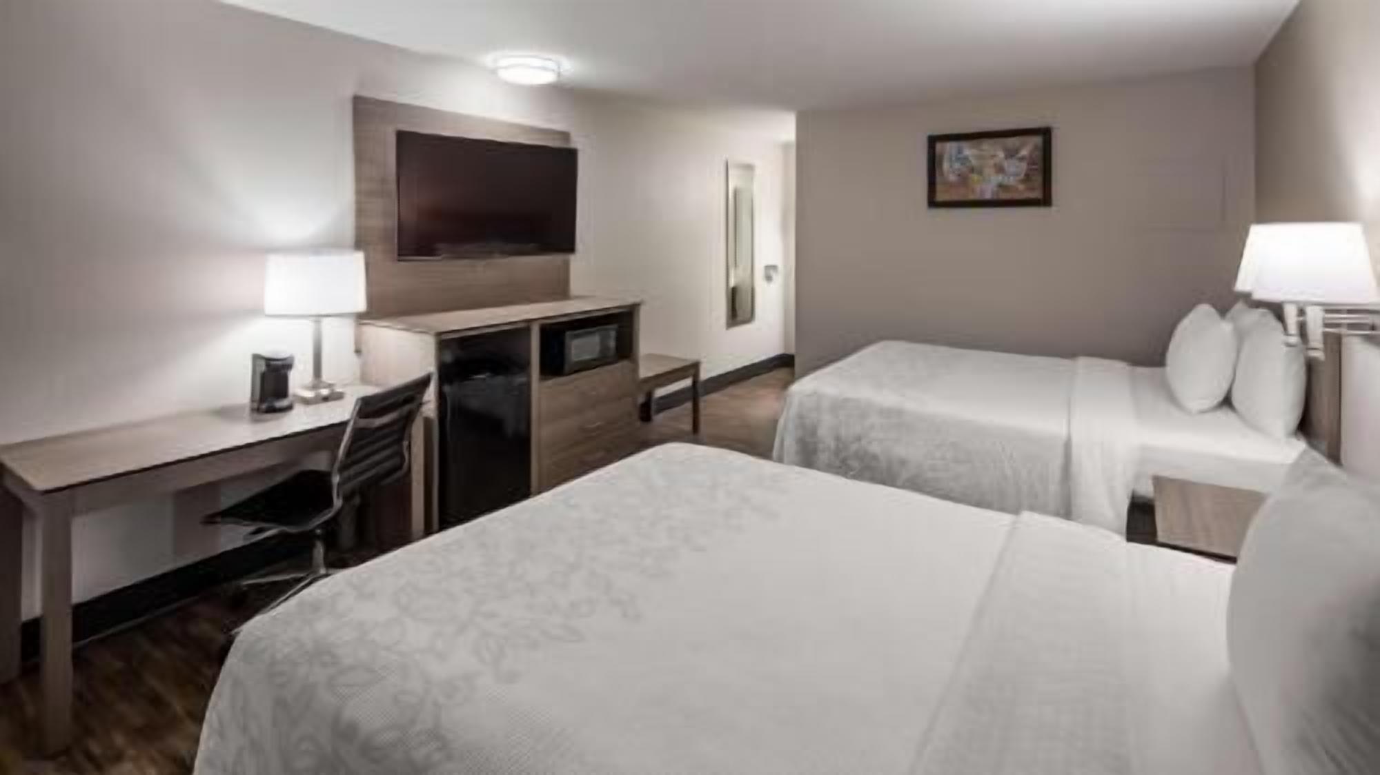 Premium bedding, Select Comfort beds, desk, laptop workspace