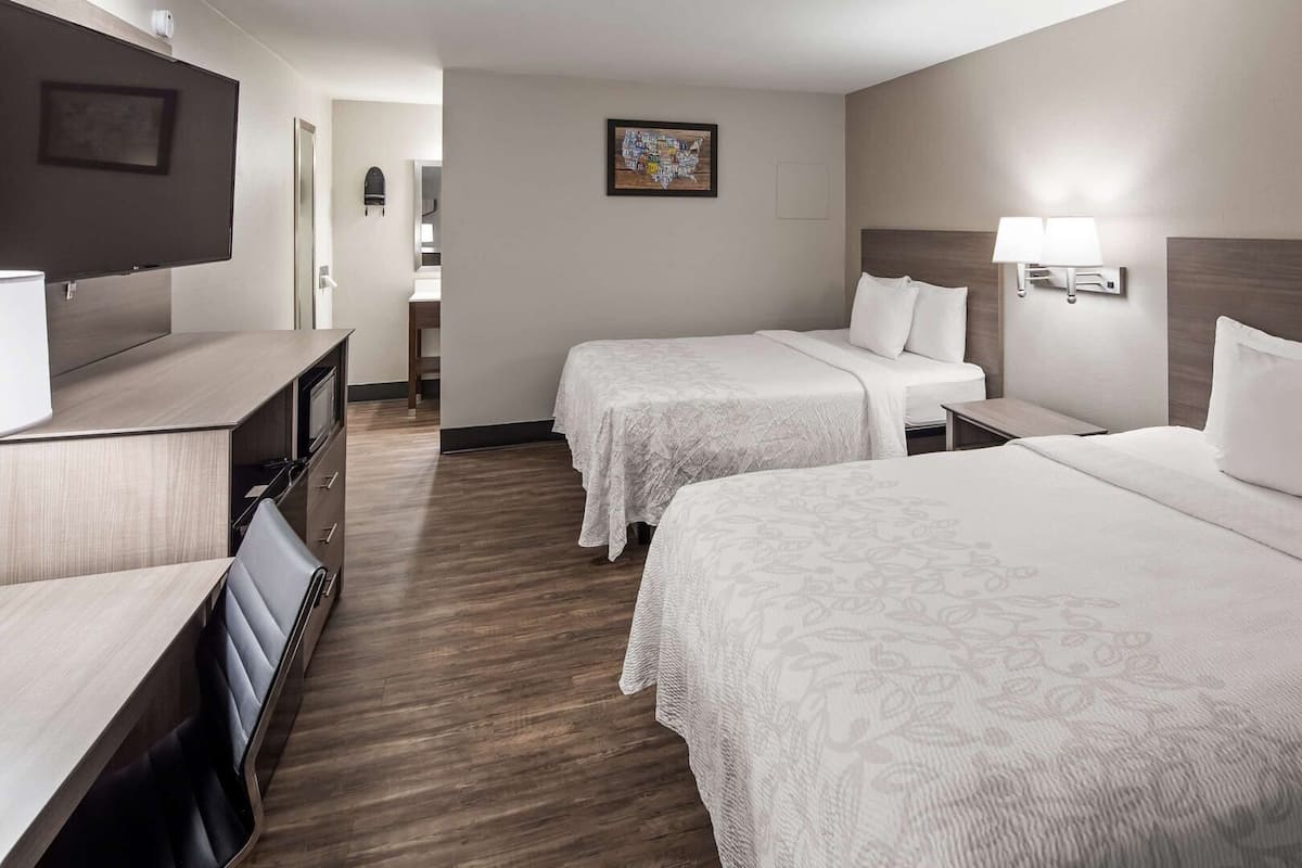 Premium bedding, Select Comfort beds, desk, laptop workspace