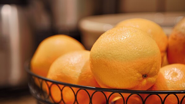 A bowl of oranges. - SureStay Hotel by Best Western Findlay (Findlay)