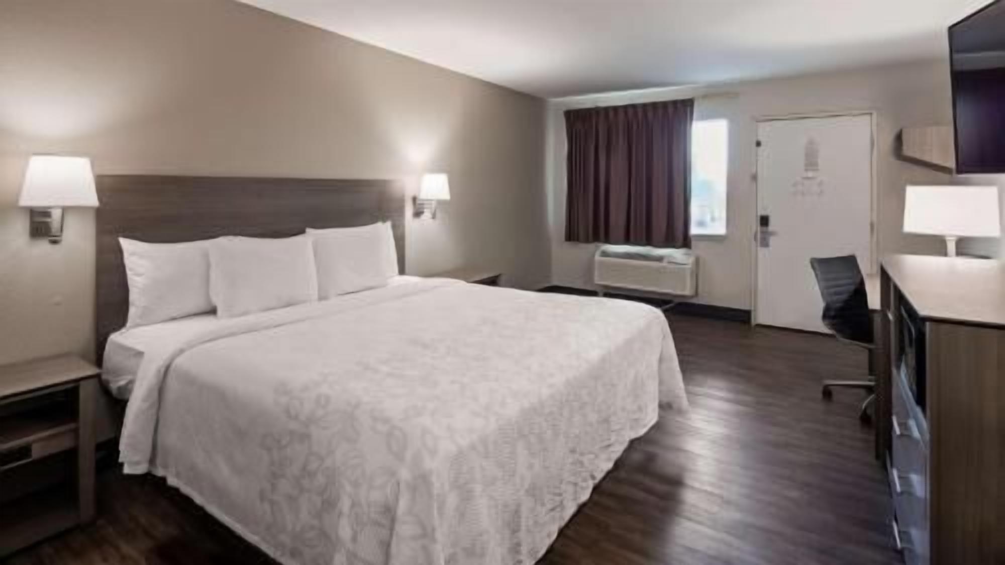 Premium bedding, Select Comfort beds, desk, laptop workspace