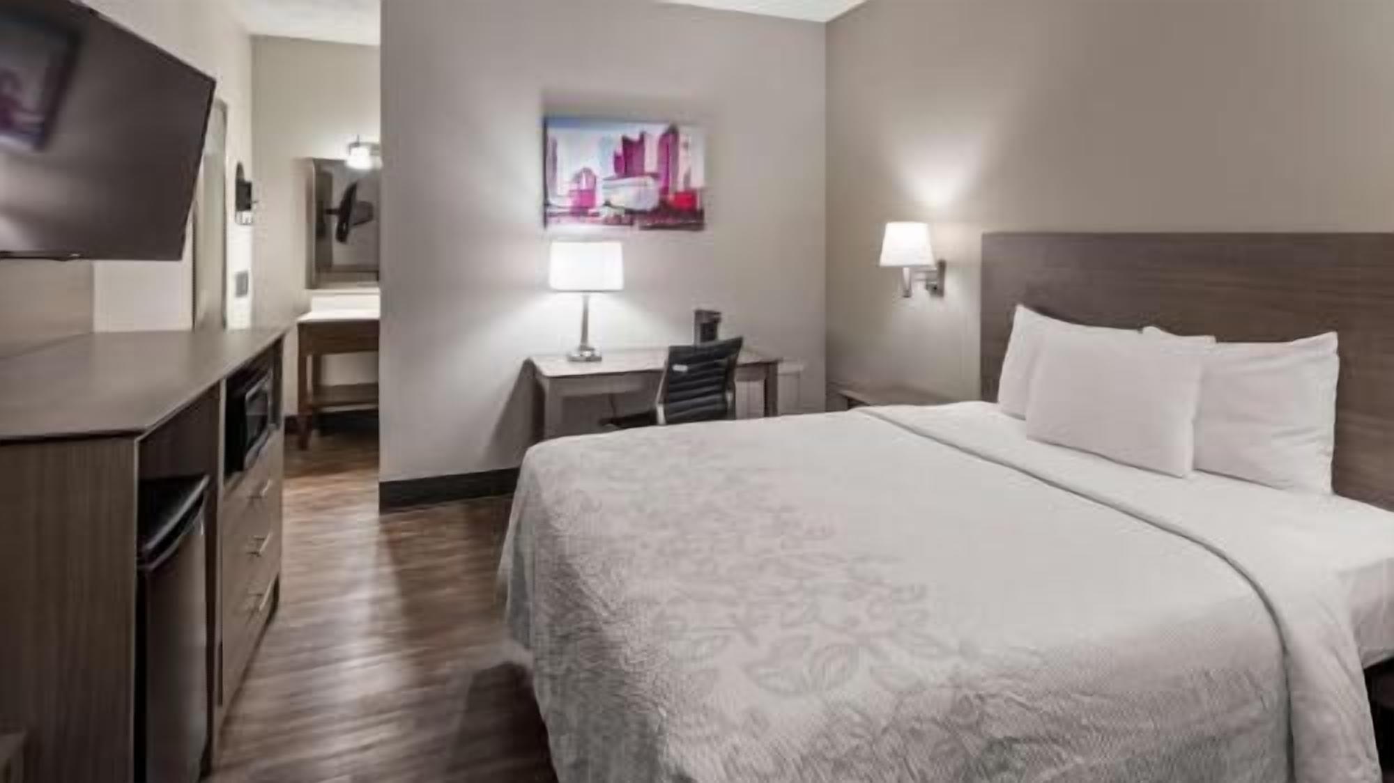 Premium bedding, Select Comfort beds, desk, laptop workspace