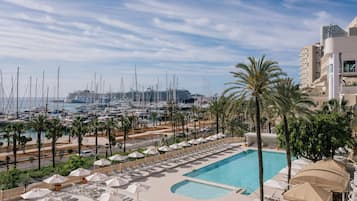 Indoor pool, seasonal outdoor pool, pool umbrellas, sun loungers