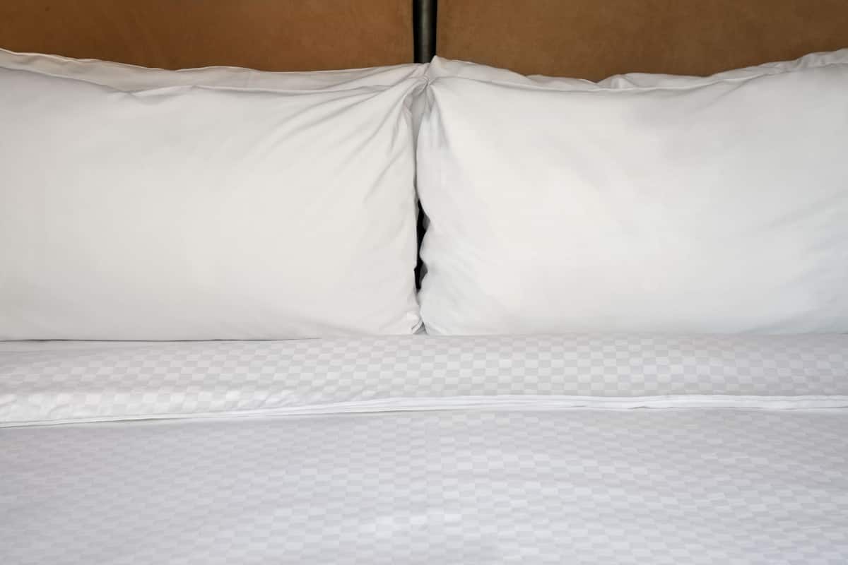 Down comforters, desk, blackout drapes, iron/ironing board