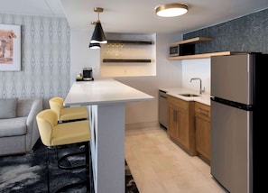Studio Suite, 1 King Bed | Private kitchen | Fridge, microwave, coffee/tea maker, eco-friendly cleaning products