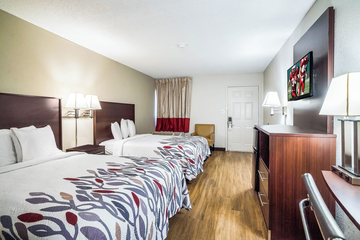 Iron/ironing board, cribs (free), WiFi (free), alarm clocks