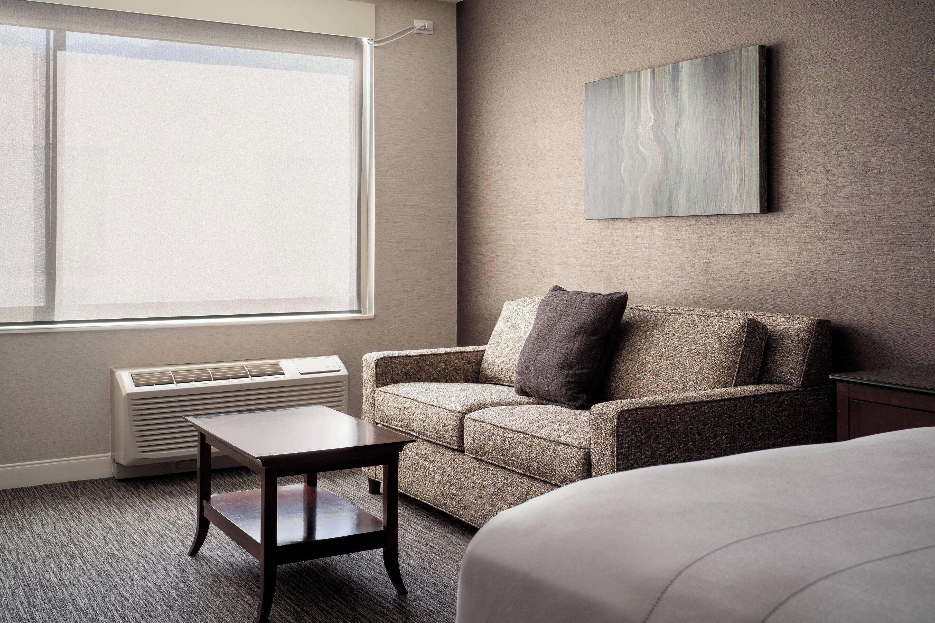 room, 1 king bed with sofa bed | living area | 42-inch smart tv with cable channels, tv, netflix