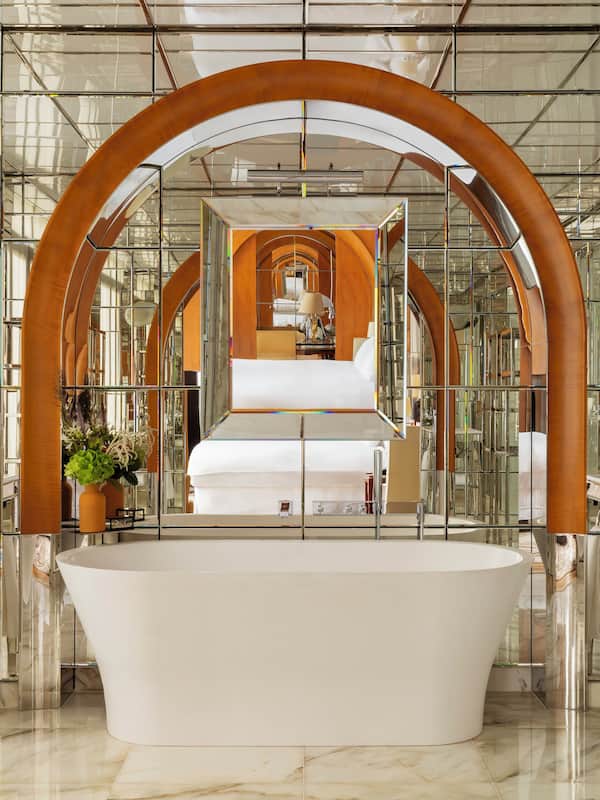 Signature Suite | Bathroom | Separate tub and shower, rainfall showerhead, eco-friendly toiletries