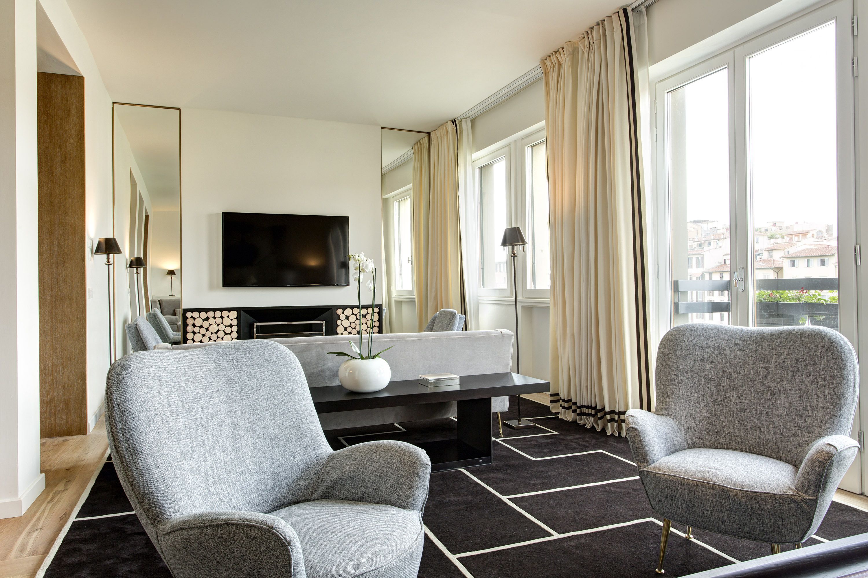 design suite, river view | living area | lcd tv