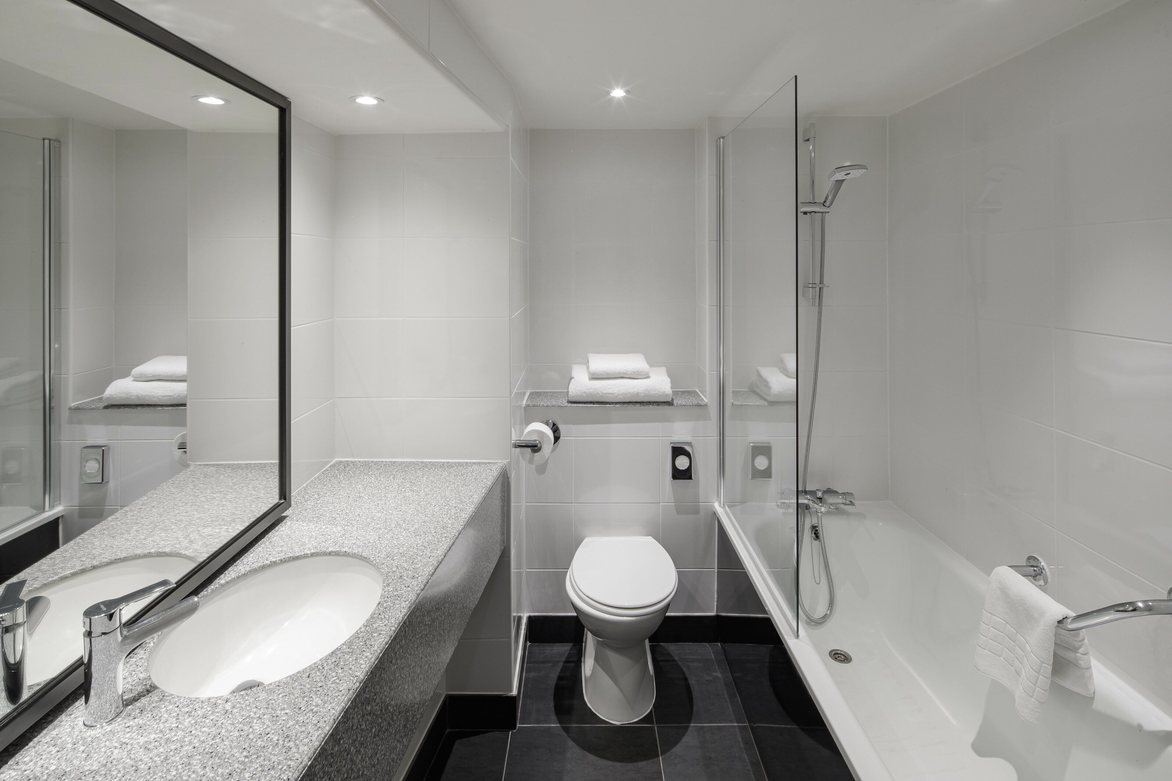 combined shower/bathtub, eco-friendly toiletries, hair dryer, bathrobes