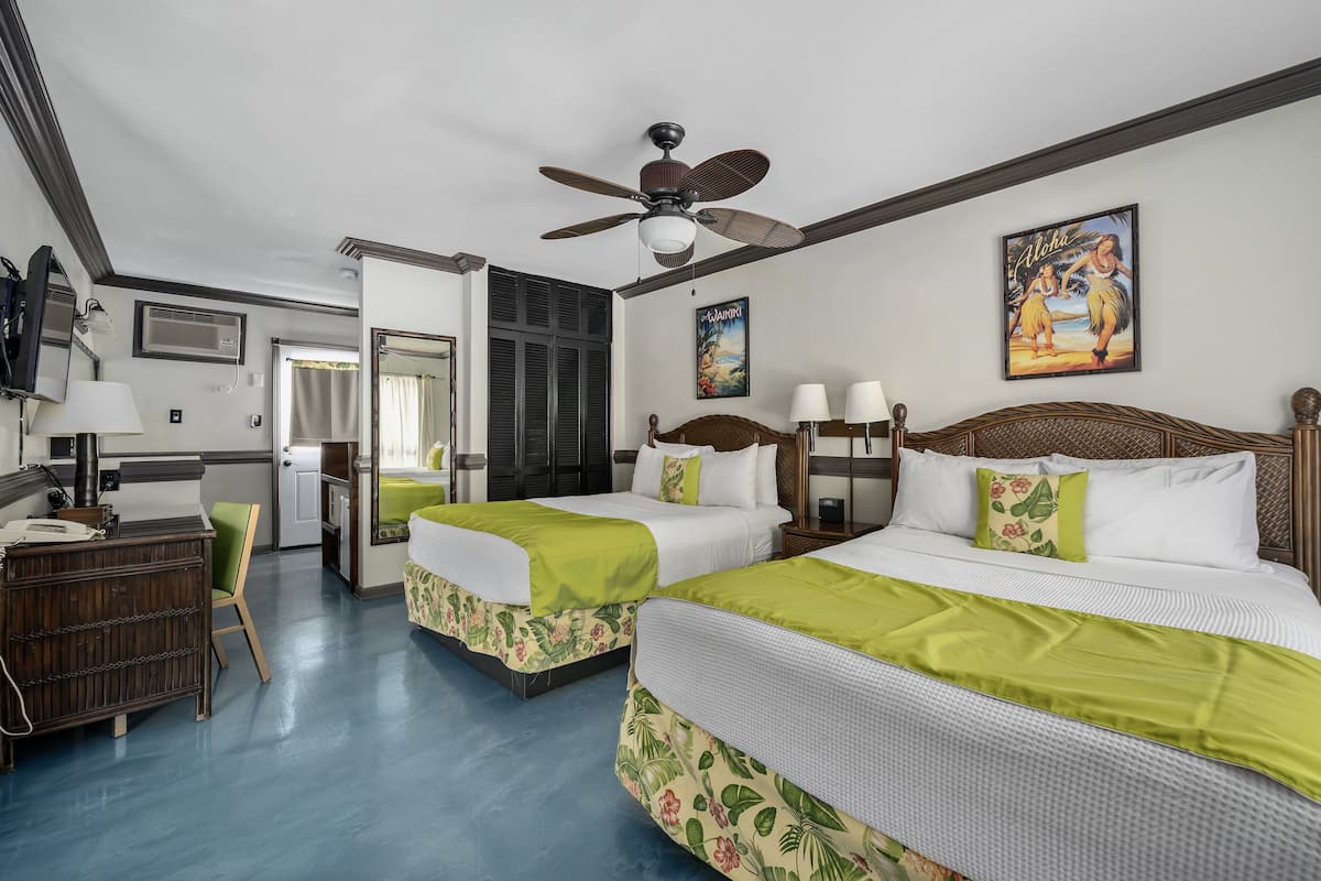 Suite, 2 Queen Beds | In-room safe, desk, laptop workspace, iron/ironing board